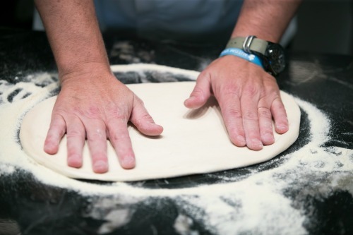 man-making-pizza-crust